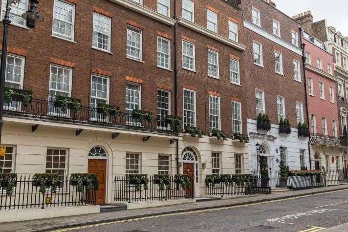 London townhouses representing client assets and property to be disclosed during financial disclosure in family law cases.