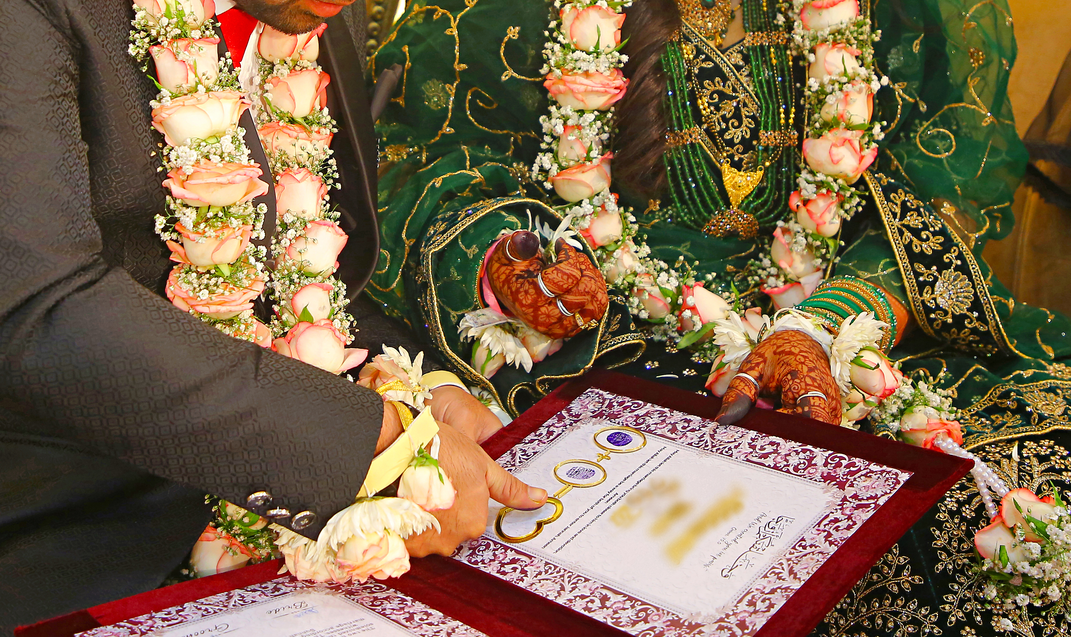 Signed Nikah certificate at a Muslim wedding ceremony