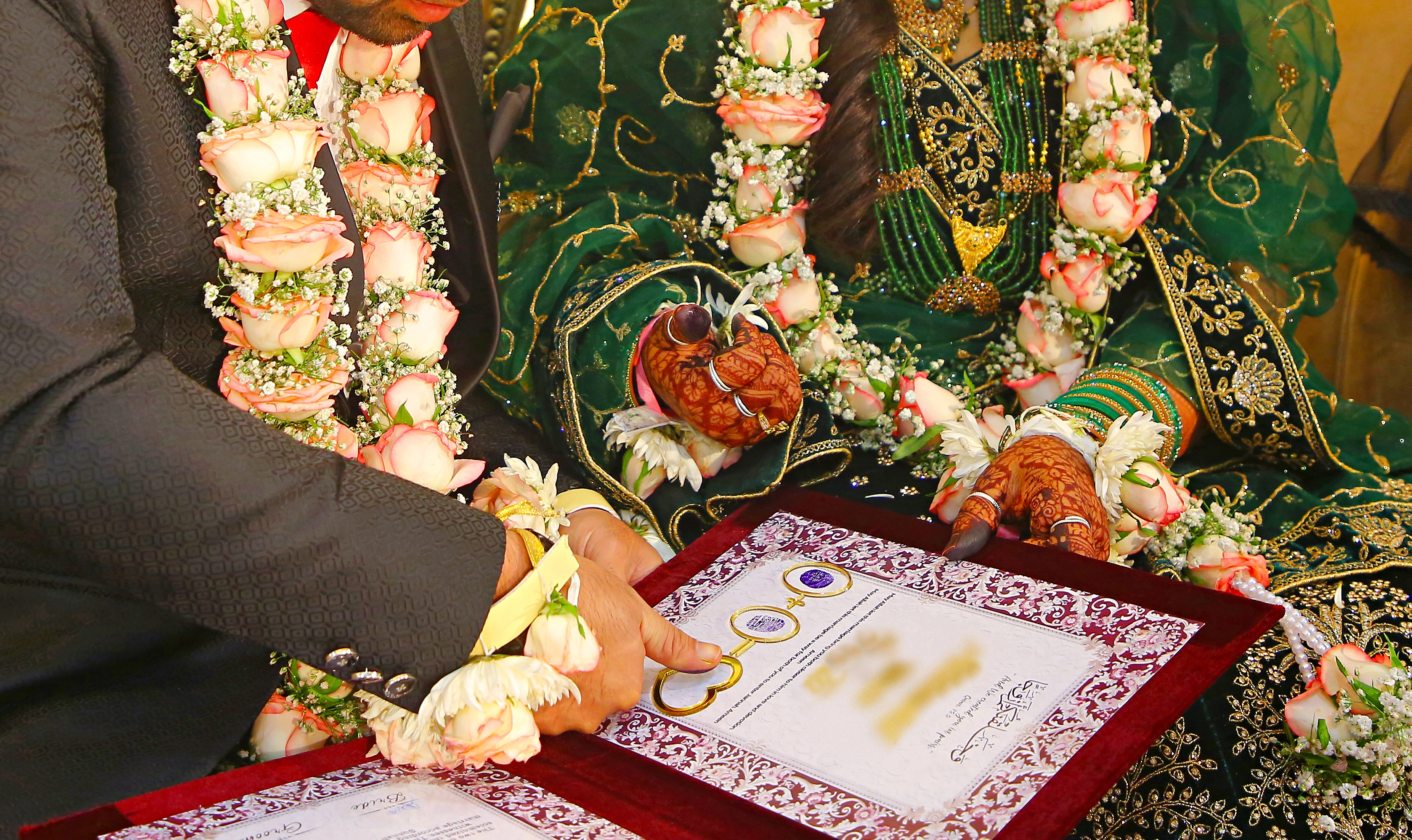Signed Nikah certificate at a Muslim wedding ceremony